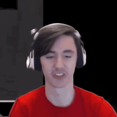 Man in Red Shirt Making Funny Face