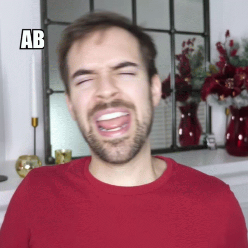 Man In Red Shirt Making Funny Face With AB GIF