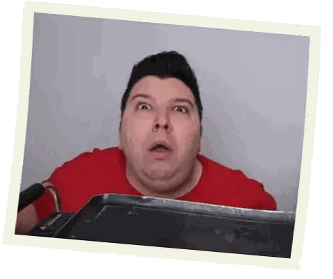 Man in Red Shirt Making Funny Face with Tray