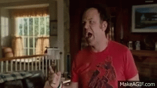 Man In Red Shirt Making Funny Face GIF
