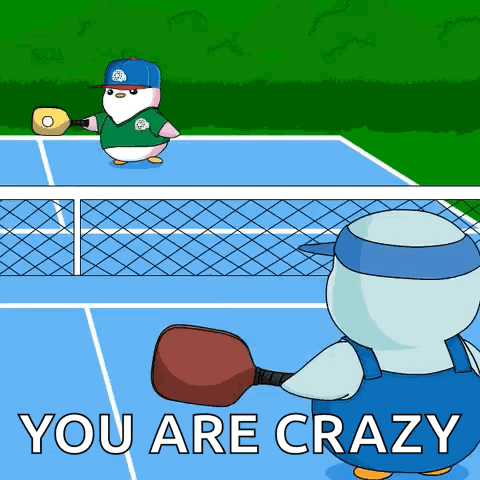 Man in Red Shirt Playing Ping Pong
