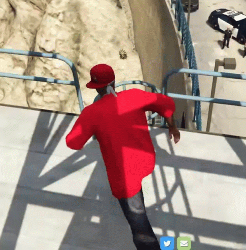 Man in Red Shirt Running Down Stairs