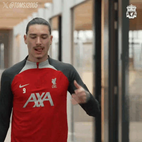 Man In Red Shirt Saying Axa GIF