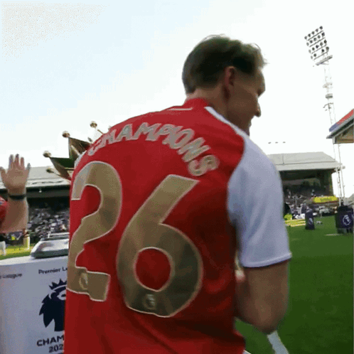 Man In Red Shirt Saying Champions GIF