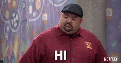 Man in Red Shirt Saying Hi