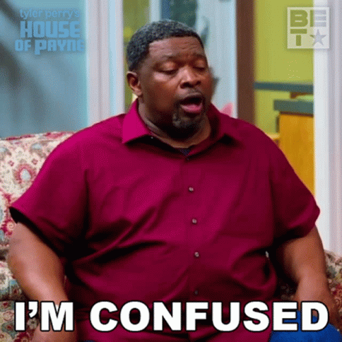 Man in Red Shirt Saying I'm Confused