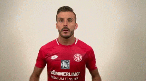 Man in Red Shirt Saying Kommerling Premium Fenster