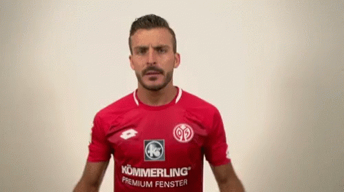 Man in Red Shirt Saying Kommerling