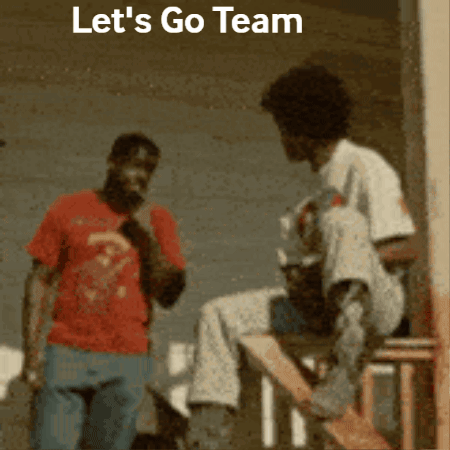 Man in Red Shirt Saying Let's Go Team