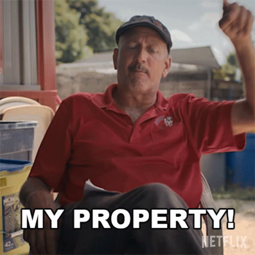 Man in Red Shirt Saying My Property