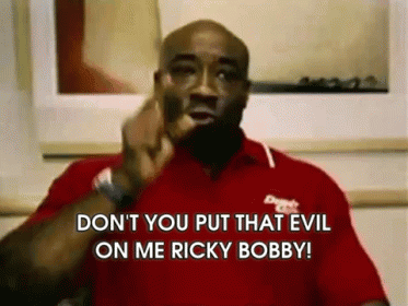 Man in Red Shirt Saying Ricky Bobby