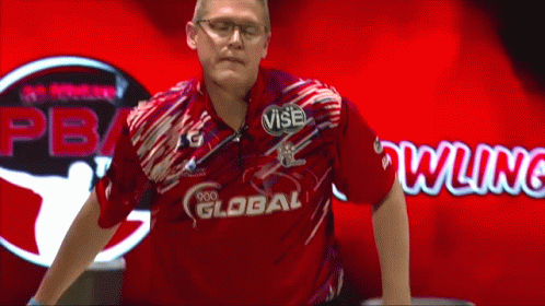 Man in Red Shirt Saying Vise