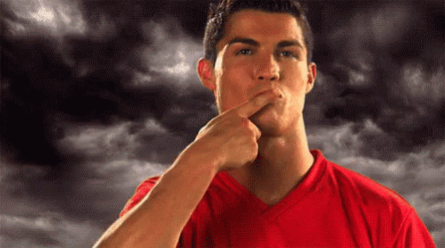 Man in Red Shirt Shushing