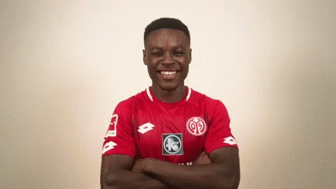 Man in Red Shirt Smiling