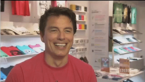 Man In Red Shirt Smiling GIF