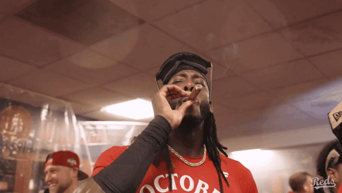 Man In Red Shirt Smoking Cigar GIF