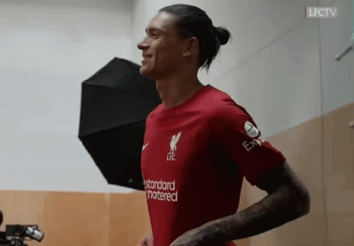 Man In Red Shirt Standard Chartered GIF