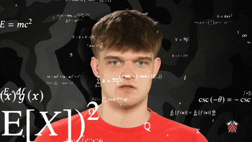 Man In Red Shirt Standing Before Blackboard GIF