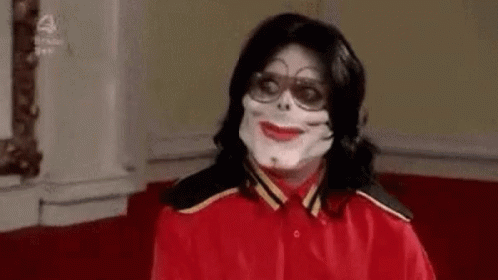 Man in Red Shirt Wearing Mask and Glasses