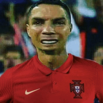 Man in Red Shirt With Cross