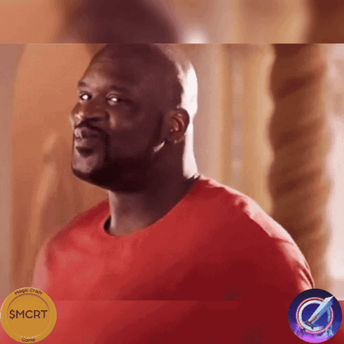 Man in Red Shirt With Gold Coin Saying $ MCRT