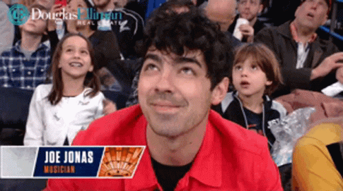 Man in Red Shirt With Joe Jonas