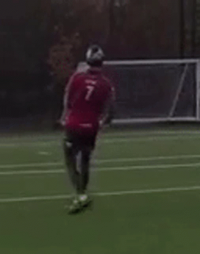 Man in Red Shirt with Number 7