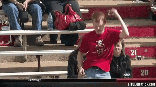 Man In Red Shirt With Skull And Crossbones
