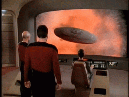 Man in Red Shirt with UFO Screen