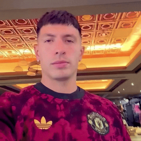 Man in Red Shirt With United