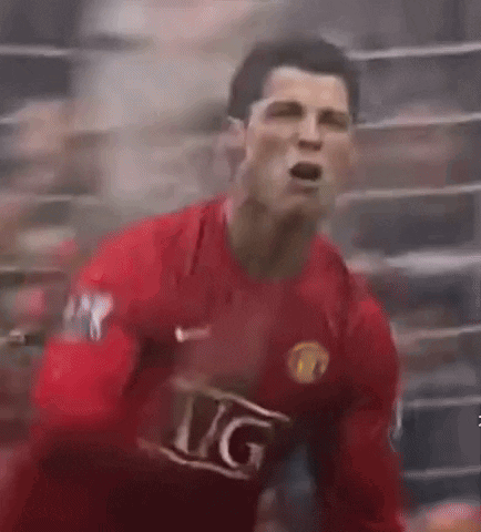 Man in Red Soccer Jersey with Letter G Screaming