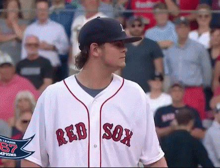 Man in Red Sox Jersey Before Crowd