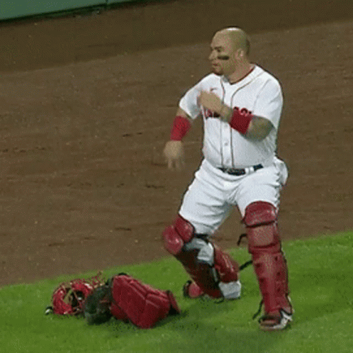 Man in Red Sox Jersey Pointing Up