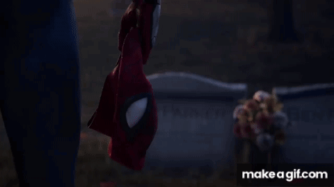 Man in Red Spider-Man Suit Putting On Helmet