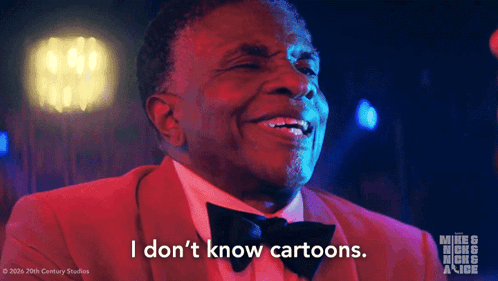 Man In Red Suit And Black Bow Tie Says I Don't Know GIF