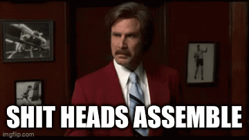 Man In Red Suit And Tie By Picture Wall GIF