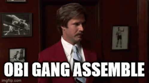 Man in Red Suit and Tie Obi Gang Assemble