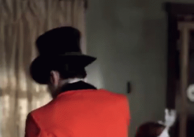 Man in Red Suit and Top Hat