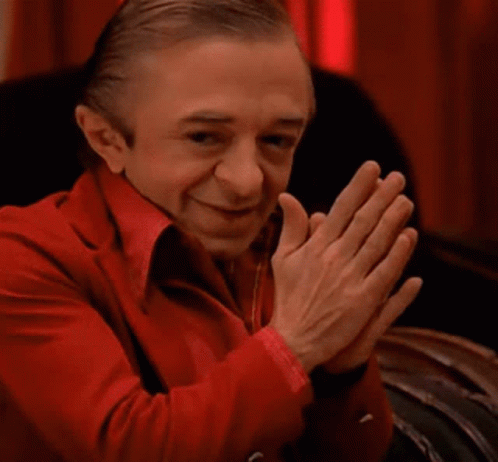 Man in Red Suit Clapping
