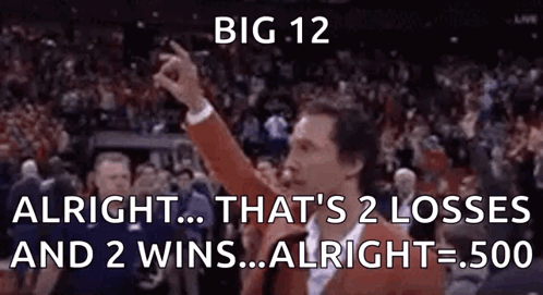 Man in Red Suit Giving Thumbs Up
