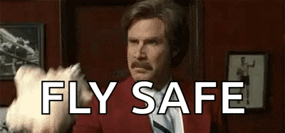 Man in Red Suit Pointing at Dog Fly Safe