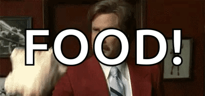 Man in Red Suit Pointing Gun at Food