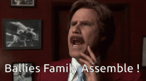 Man in Red Suit Saying Ballies Family Assemble