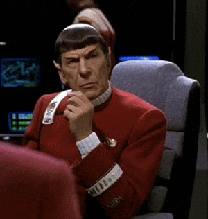 Man in Red Suit with S.T.A.R. Badge