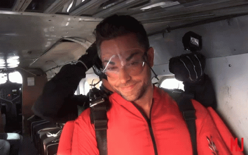 Man in Red Suit with Safety Goggles