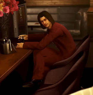 Man in Red Suit with Yo on Chair