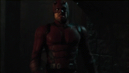 Man in Red Superhero Costume Screaming