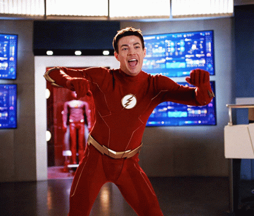 Man in Red Superhero Costume with Lightning Bolt