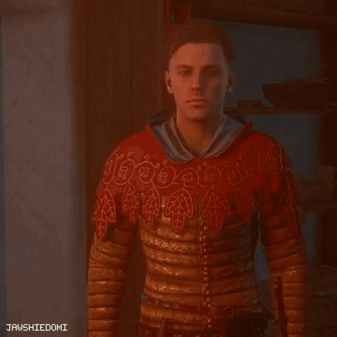 Man in Red Sweater and Gold Sleeves Standing