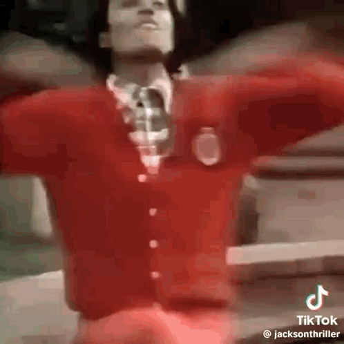 Man In Red Sweater And Tie Dancing GIF